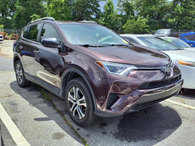 used 2018 Toyota RAV4 car, priced at $21,875