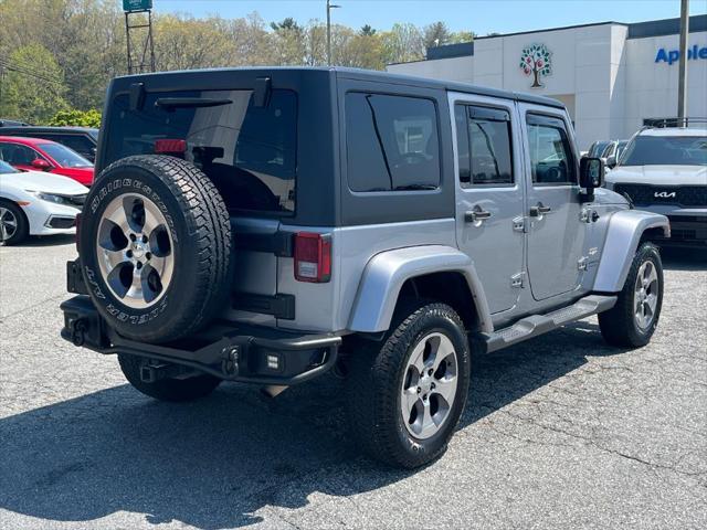 used 2014 Jeep Wrangler Unlimited car, priced at $17,872
