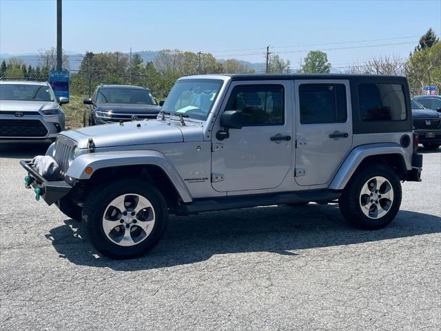 used 2014 Jeep Wrangler Unlimited car, priced at $17,872
