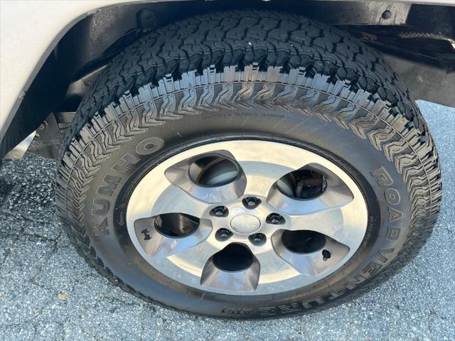 used 2014 Jeep Wrangler Unlimited car, priced at $17,872
