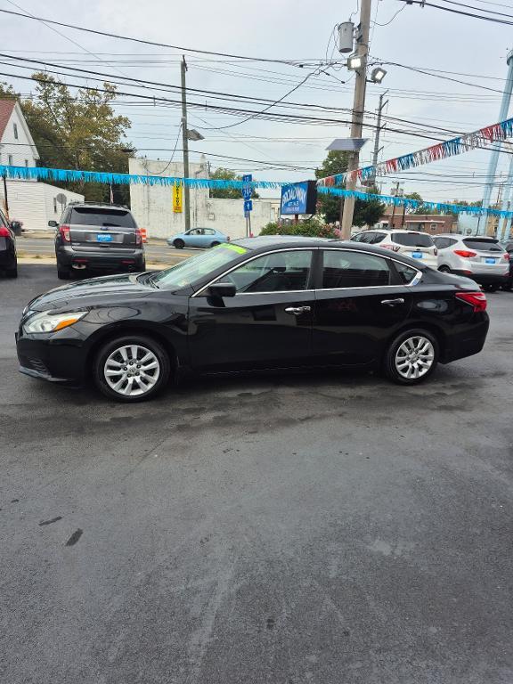 used 2016 Nissan Altima car, priced at $9,999