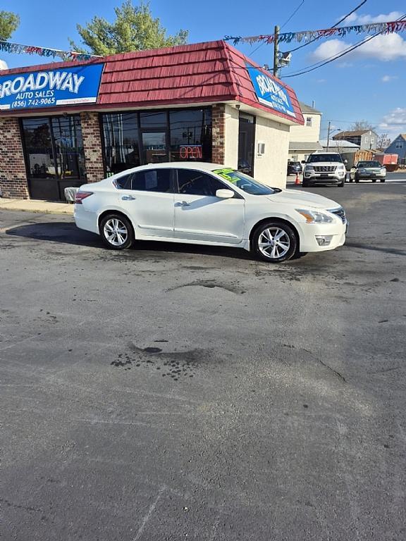 used 2015 Nissan Altima car, priced at $8,999