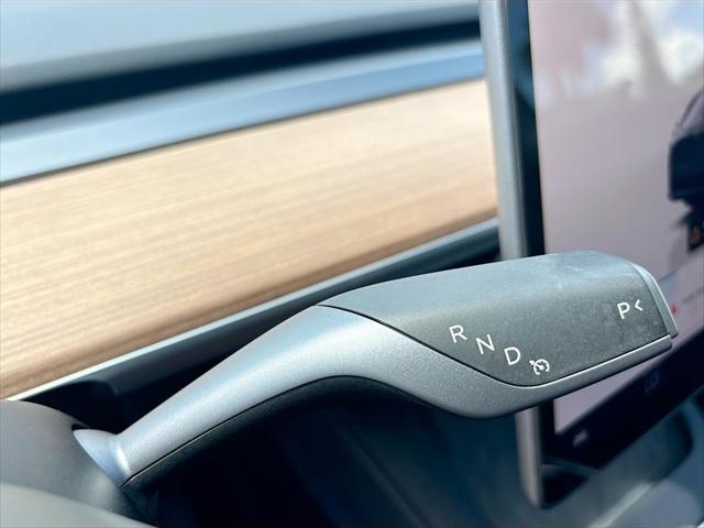 used 2025 Tesla Model Y car, priced at $36,597