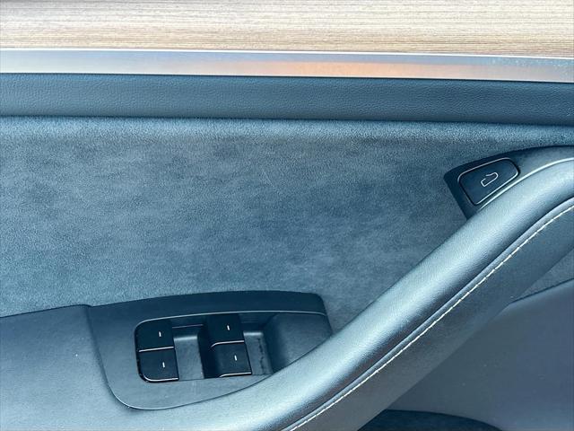 used 2025 Tesla Model Y car, priced at $36,597