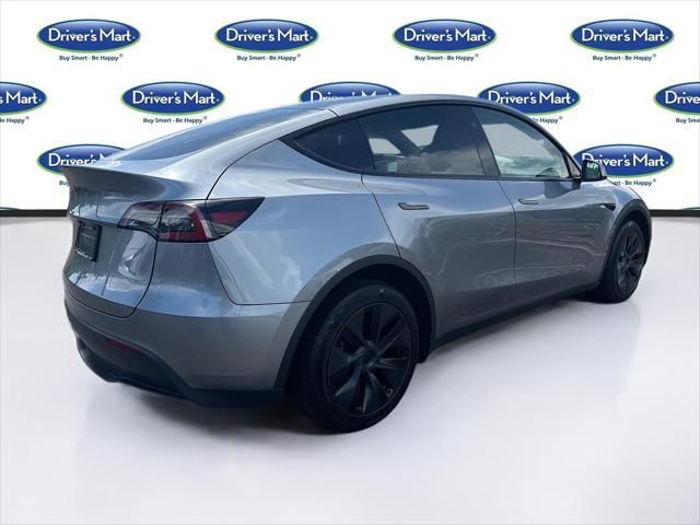 used 2025 Tesla Model Y car, priced at $36,597