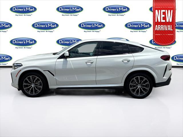 used 2023 BMW X6 car, priced at $55,997