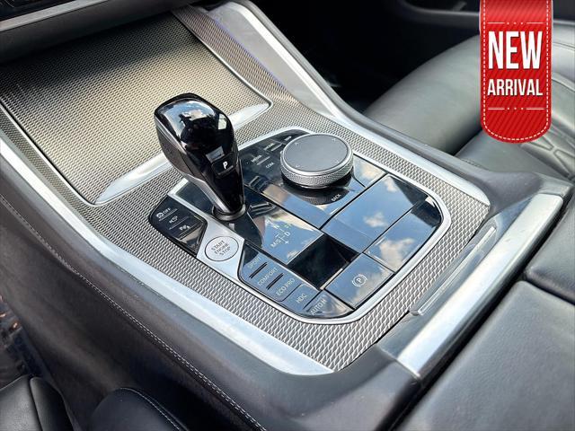 used 2023 BMW X6 car, priced at $55,997
