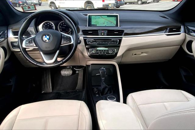 used 2018 BMW X1 car, priced at $19,149