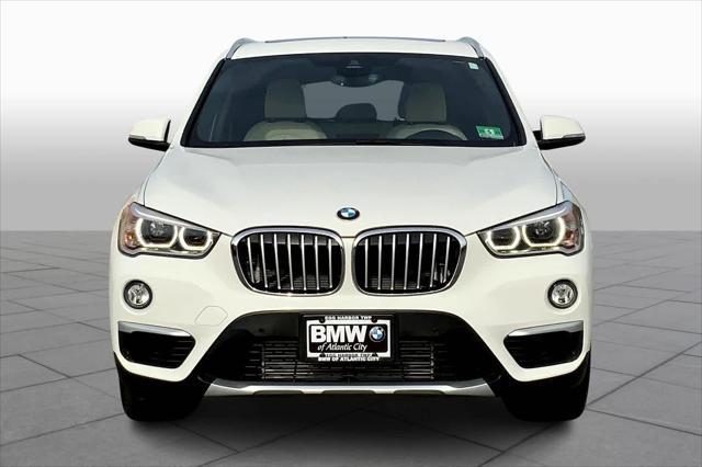 used 2018 BMW X1 car, priced at $19,149