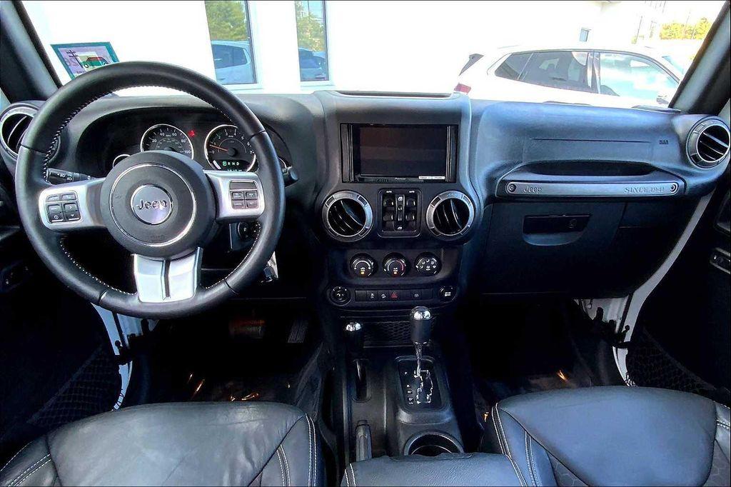 used 2017 Jeep Wrangler Unlimited car, priced at $21,516