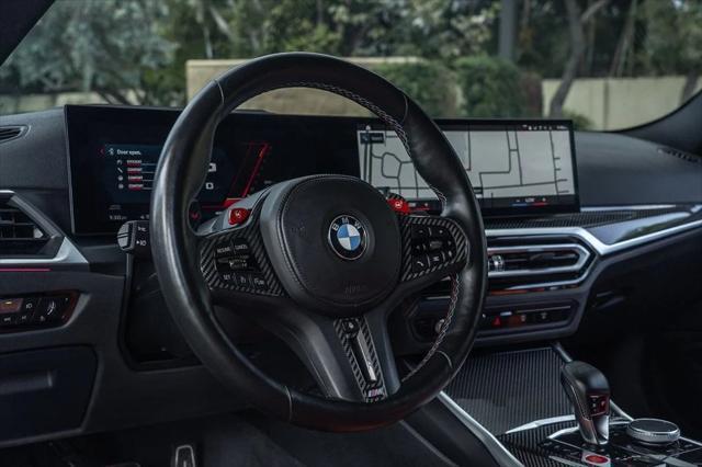 used 2024 BMW M4 car, priced at $83,995