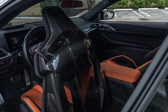 used 2024 BMW M4 car, priced at $83,995