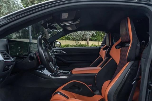 used 2024 BMW M4 car, priced at $83,995
