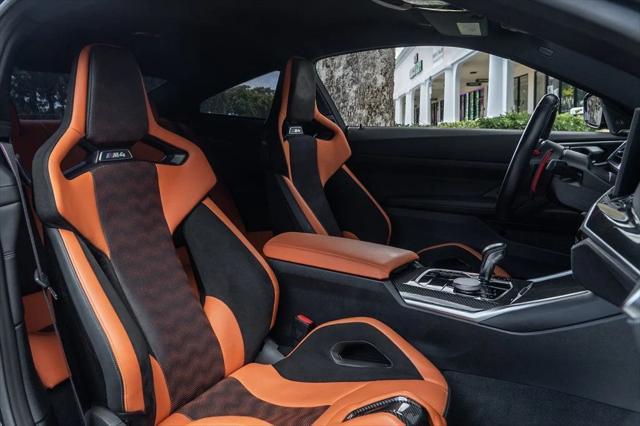 used 2024 BMW M4 car, priced at $83,995