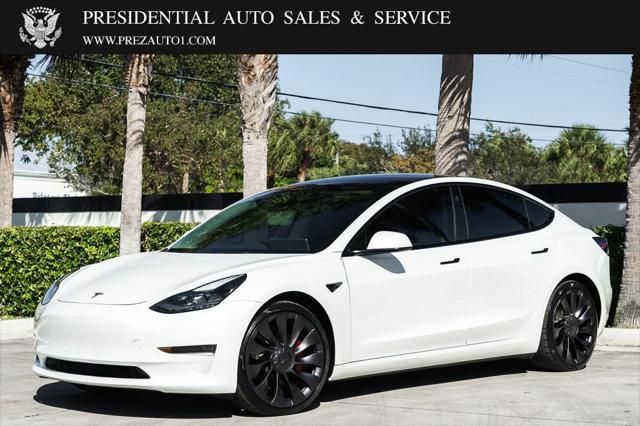 used 2022 Tesla Model 3 car, priced at $31,995