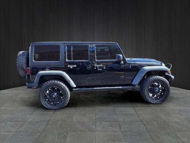 used 2015 Jeep Wrangler Unlimited car, priced at $22,424