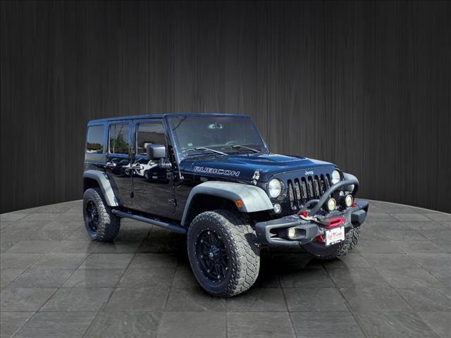 used 2015 Jeep Wrangler Unlimited car, priced at $22,424