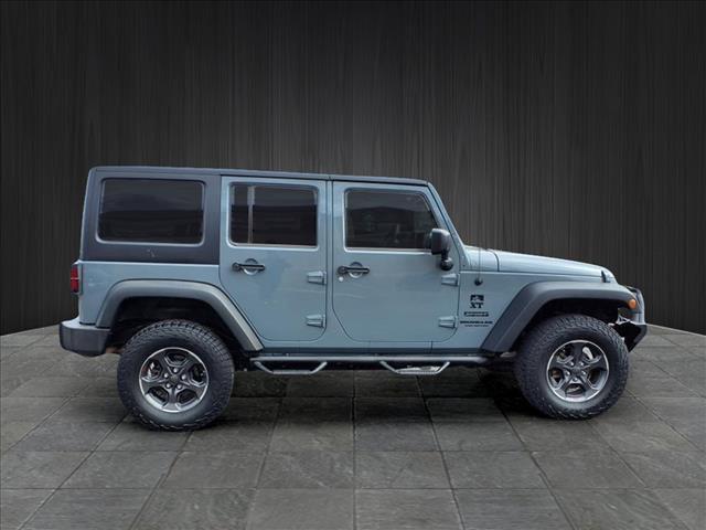 used 2015 Jeep Wrangler Unlimited car, priced at $18,893