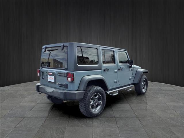 used 2015 Jeep Wrangler Unlimited car, priced at $18,893