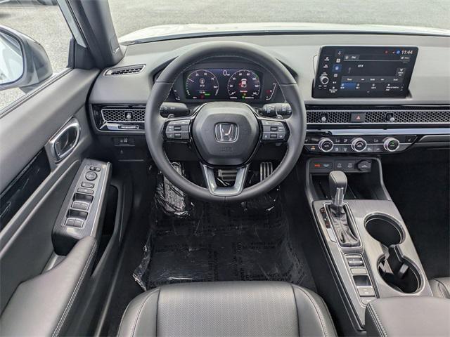 new 2025 Honda Civic Hybrid car, priced at $30,584
