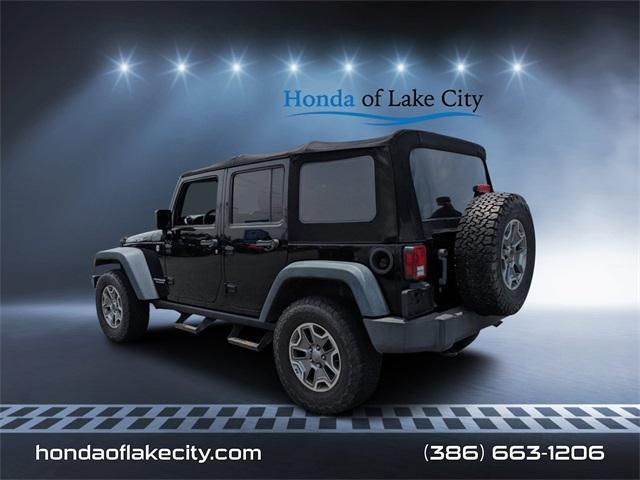 used 2013 Jeep Wrangler Unlimited car, priced at $19,596