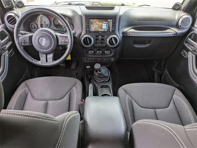 used 2013 Jeep Wrangler Unlimited car, priced at $19,596