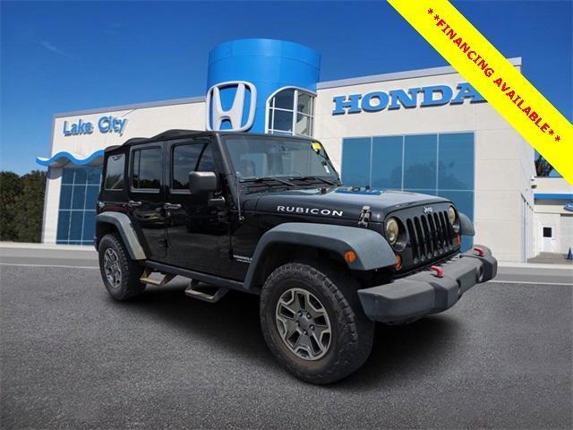 used 2013 Jeep Wrangler Unlimited car, priced at $18,899