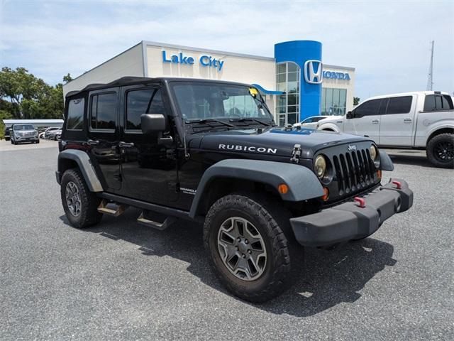 used 2013 Jeep Wrangler Unlimited car, priced at $22,741