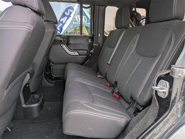 used 2013 Jeep Wrangler Unlimited car, priced at $19,596