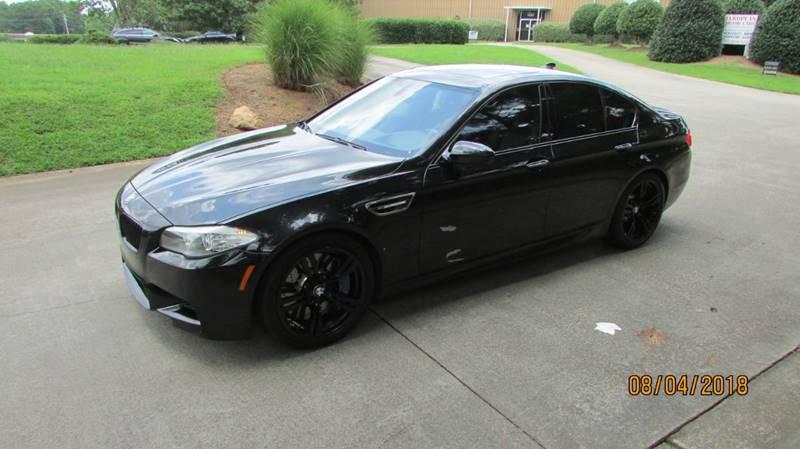 used 2013 BMW M5 car, priced at $19,950
