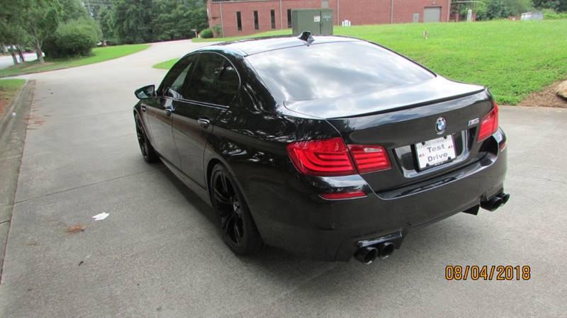 used 2013 BMW M5 car, priced at $19,950