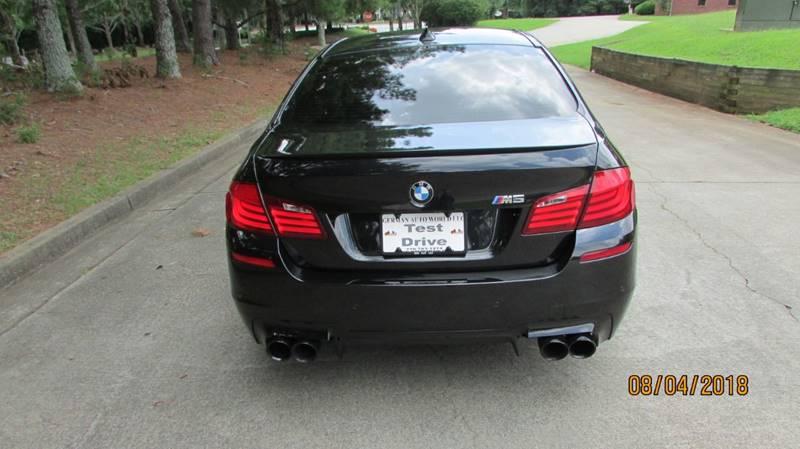 used 2013 BMW M5 car, priced at $19,950