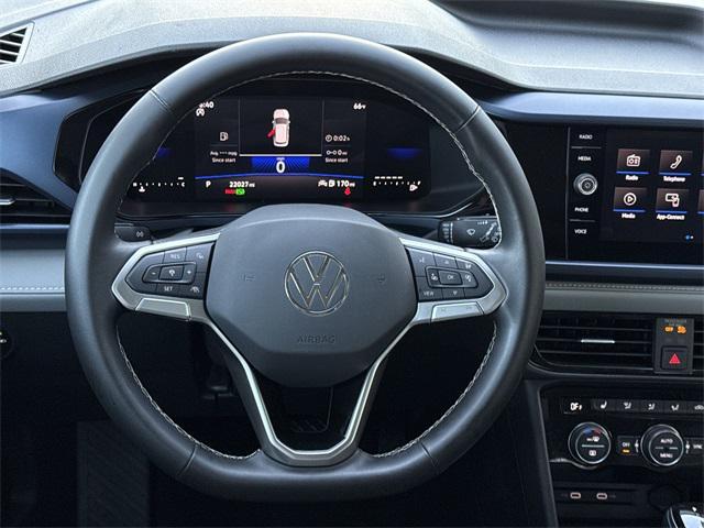 used 2024 Volkswagen Taos car, priced at $24,300