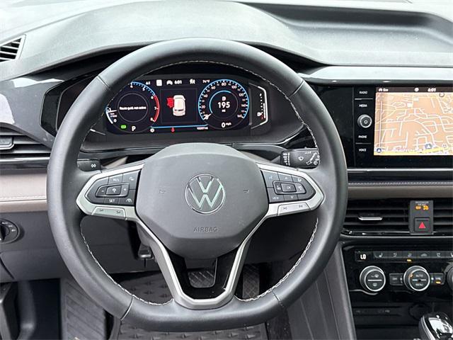 used 2024 Volkswagen Taos car, priced at $30,299