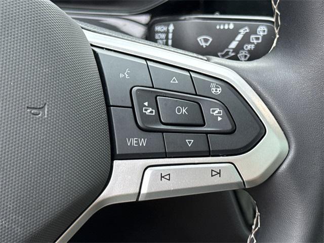 used 2024 Volkswagen Taos car, priced at $30,299