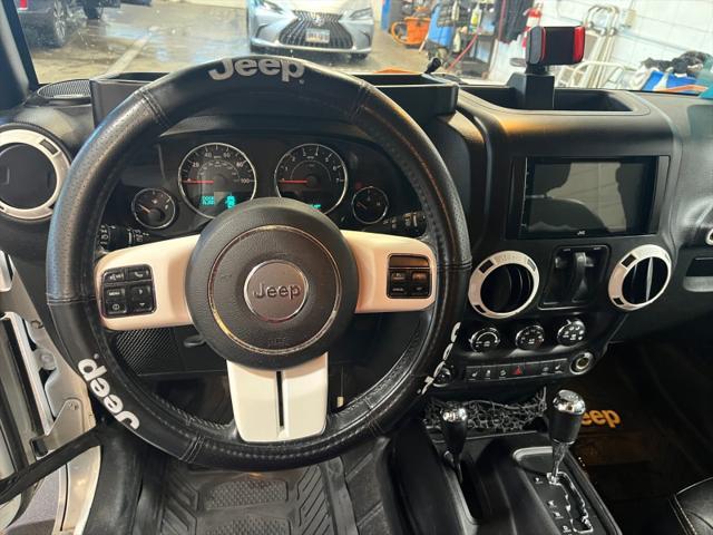 used 2015 Jeep Wrangler car, priced at $13,999