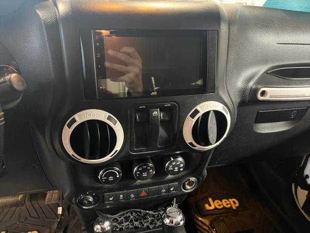 used 2015 Jeep Wrangler car, priced at $13,999