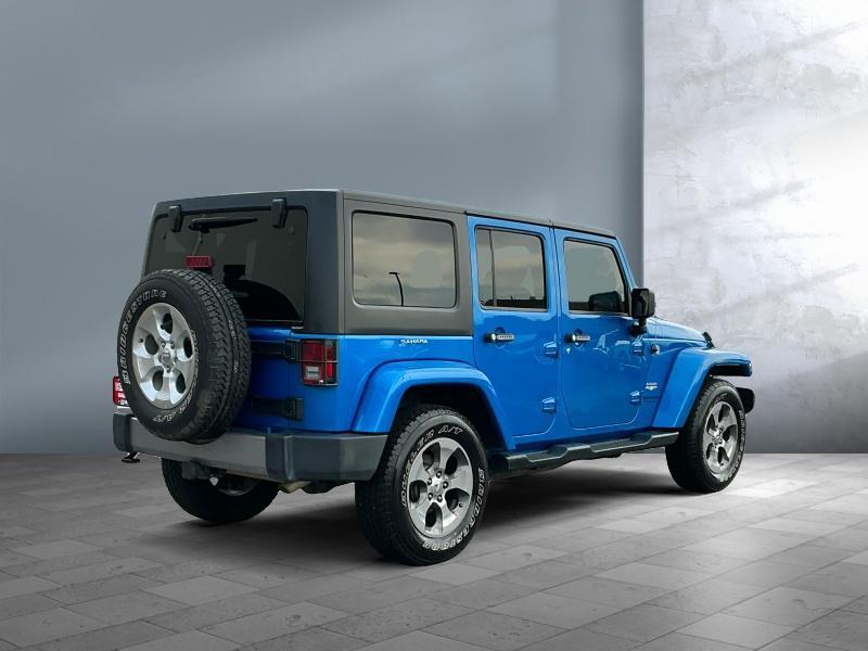used 2015 Jeep Wrangler Unlimited car, priced at $22,499