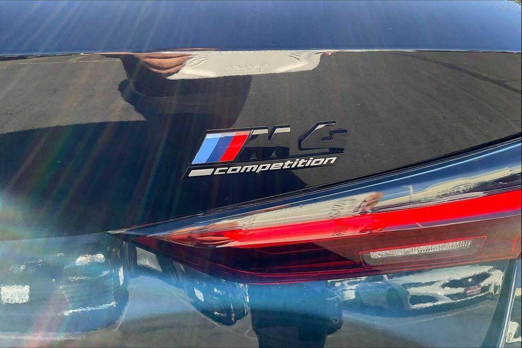 used 2024 BMW M4 car, priced at $77,772