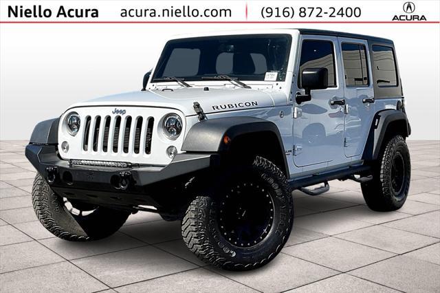 used 2016 Jeep Wrangler Unlimited car, priced at $29,449