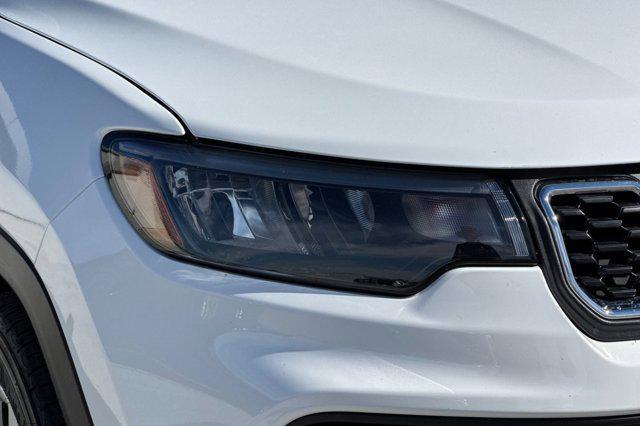 used 2025 Jeep Compass car, priced at $19,997