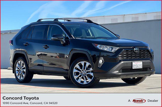 used 2021 Toyota RAV4 car, priced at $29,998