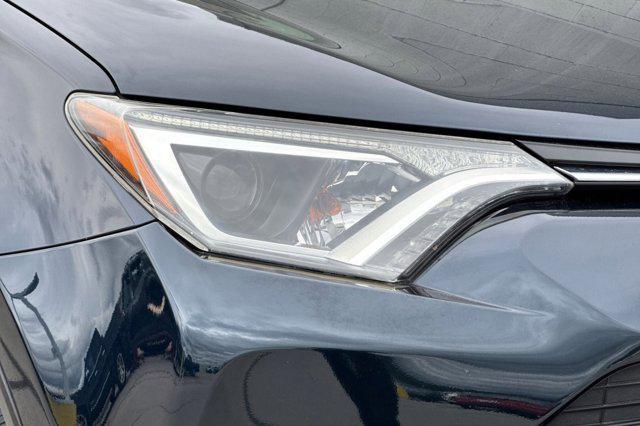 used 2018 Toyota RAV4 Hybrid car, priced at $20,999