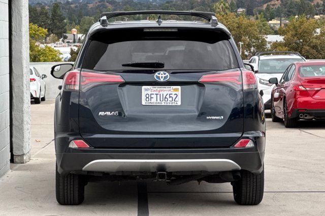 used 2018 Toyota RAV4 Hybrid car, priced at $20,999