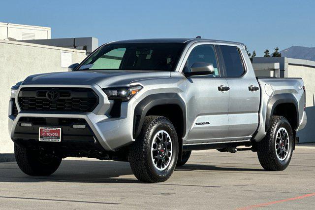 used 2024 Toyota Tacoma car, priced at $45,999