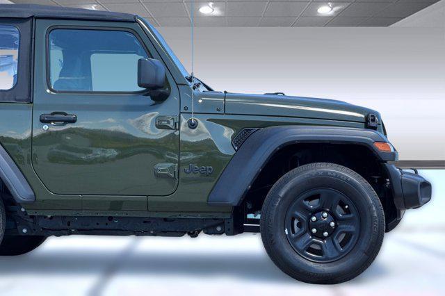 used 2023 Jeep Wrangler car, priced at $23,996