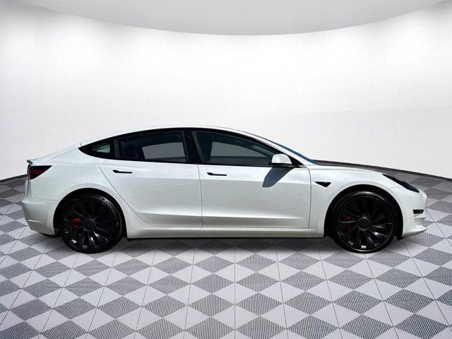 used 2023 Tesla Model 3 car, priced at $29,999