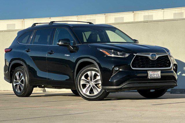 used 2021 Toyota Highlander Hybrid car, priced at $35,988