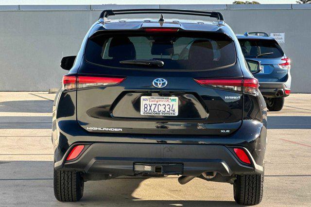 used 2021 Toyota Highlander Hybrid car, priced at $35,988