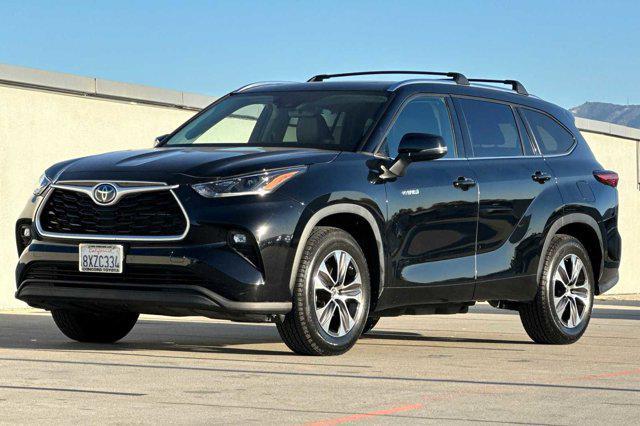 used 2021 Toyota Highlander Hybrid car, priced at $35,988